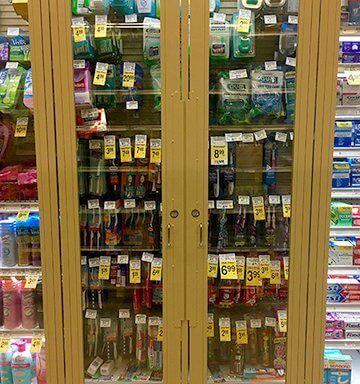 Products behind locked cases at the Potrero Center Safeway. Photo: JACOB BOURNE