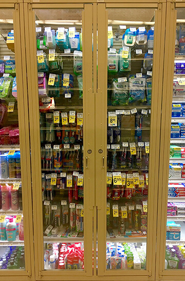 Products behind locked cases at the Potrero Center Safeway. Photo: JACOB BOURNE