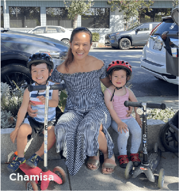 Photo of District 10 Resident, Chamisa, with her children